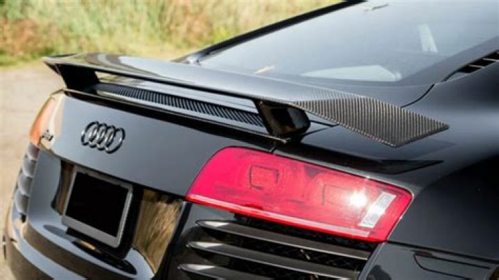 What is a spoiler on a vehicle